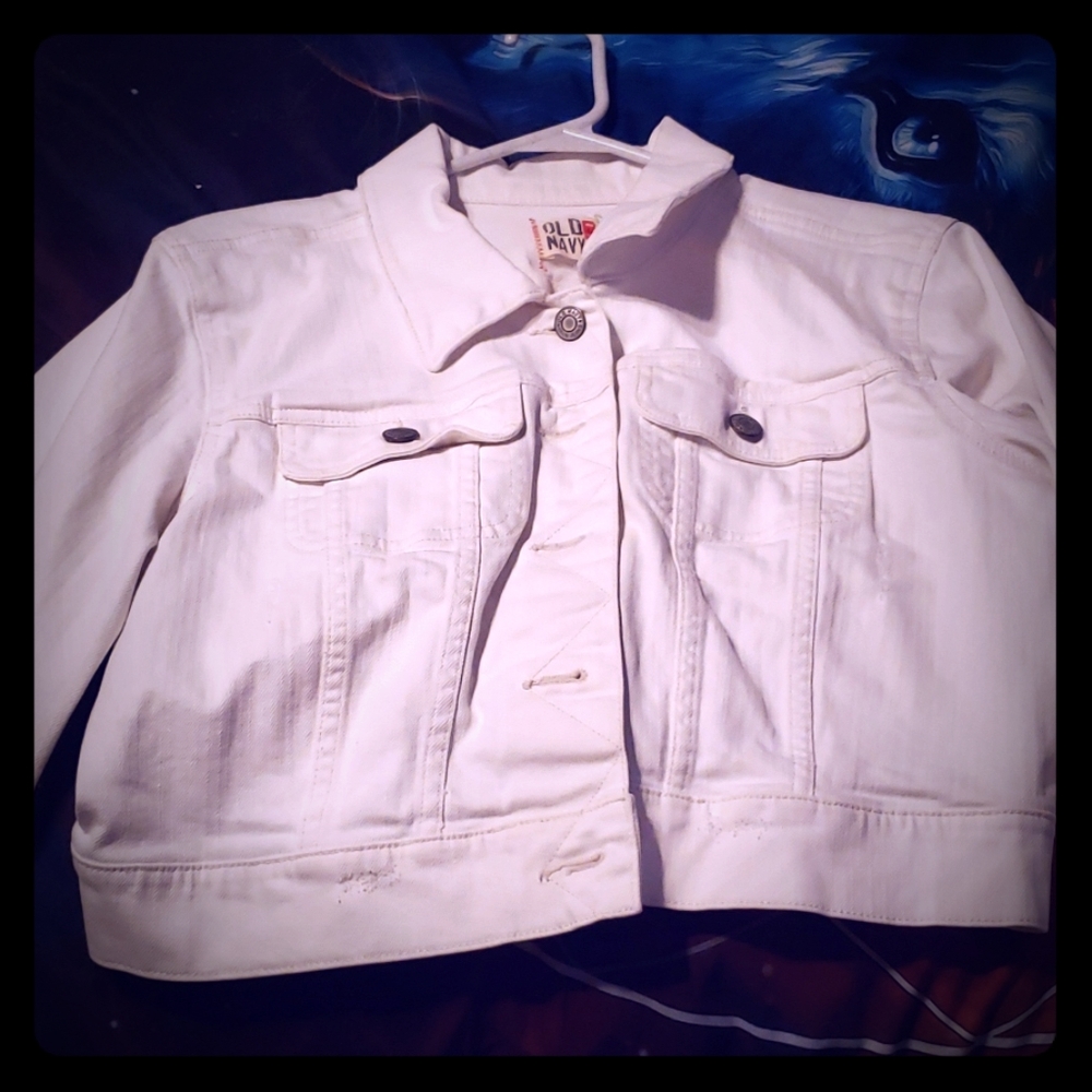 A long sleeve white jean jacket